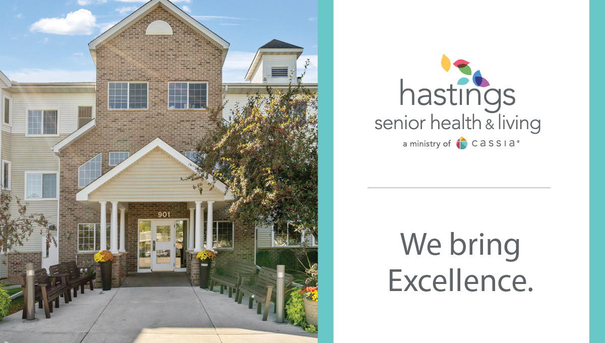 Exterior of Hastings Senior Health & Living with the community logo and tagline, “We bring Excellence.”